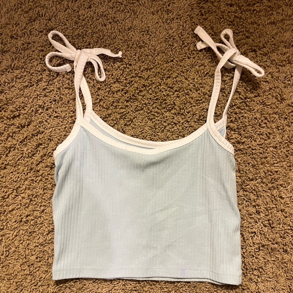 Cute light blue and white top, no tags but fits like S/XS